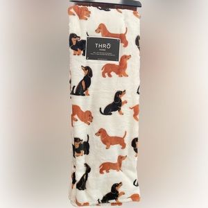 Dachshund themed throw blanket.